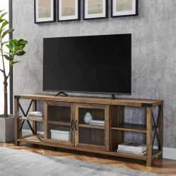 70 in. Reclaimed Barnwood Composite TV Stand Fits TVs Up to 78 in. with Storage Doors by Welwick Designs