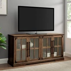 58 in. Reclaimed Barnwood Composite TV Stand Fits TVs Up to 64 in. with Storage Doors by Welwick Designs